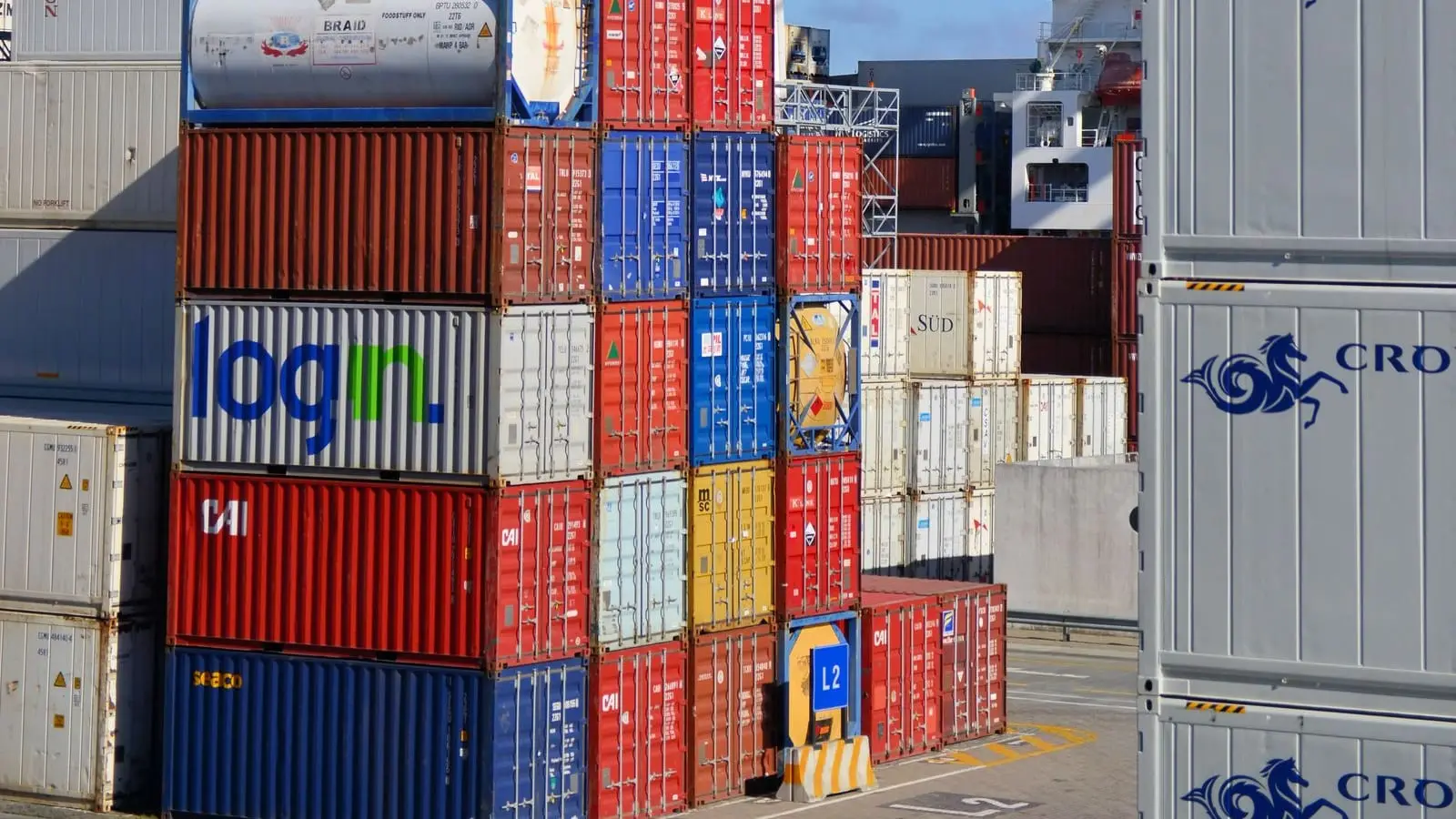 Colourful shipping containers stacked at a container terminal